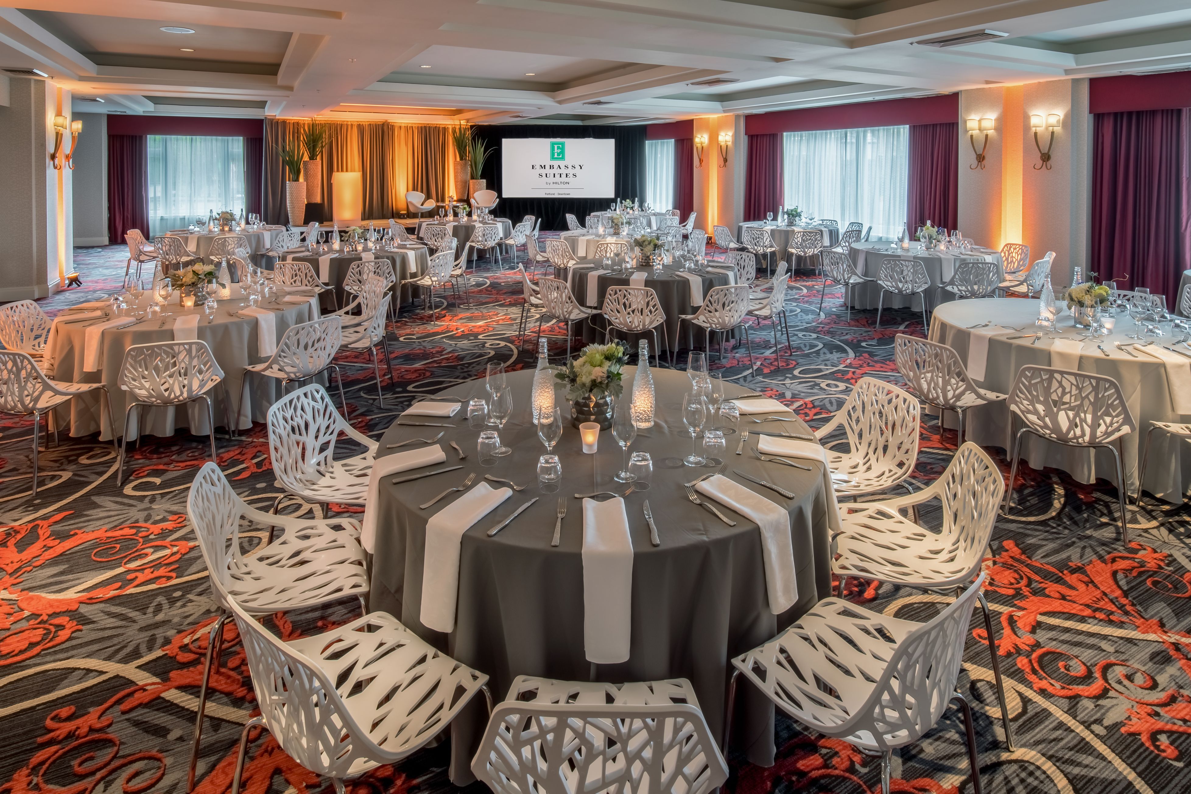 a large room with tables and chairs