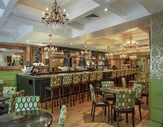 a restaurant with tables and chairs