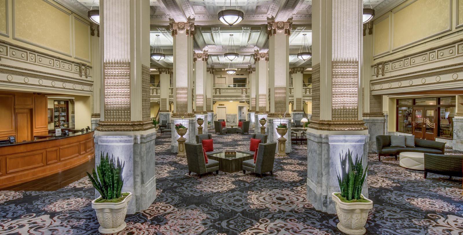 a room with columns and chairs