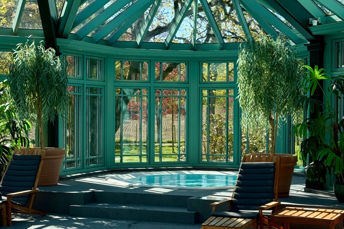a pool in a glass room