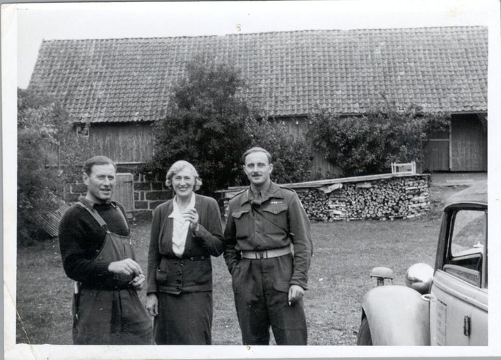 a group of people standing in front of a building