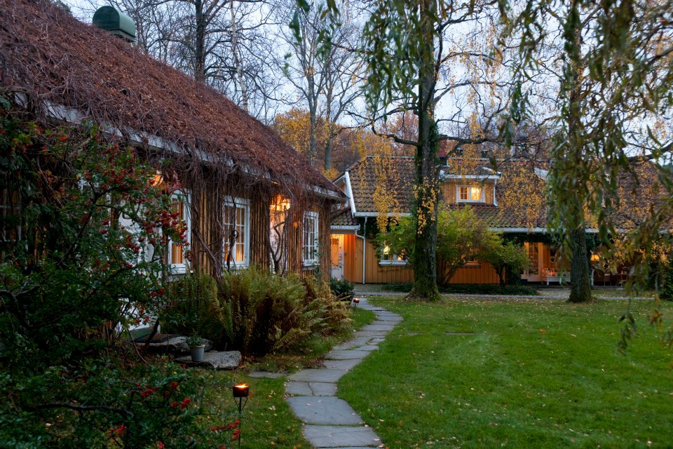 a house with a lawn and a path