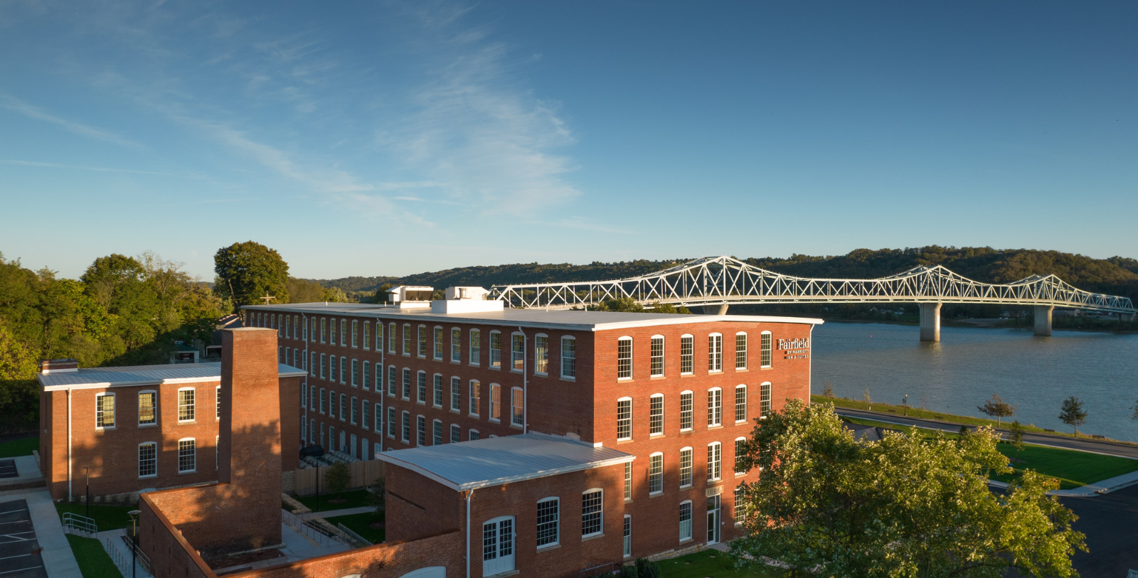 a building with a bridge in the background