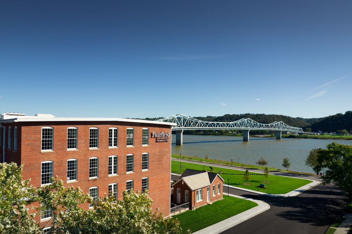 a building with a bridge in the background