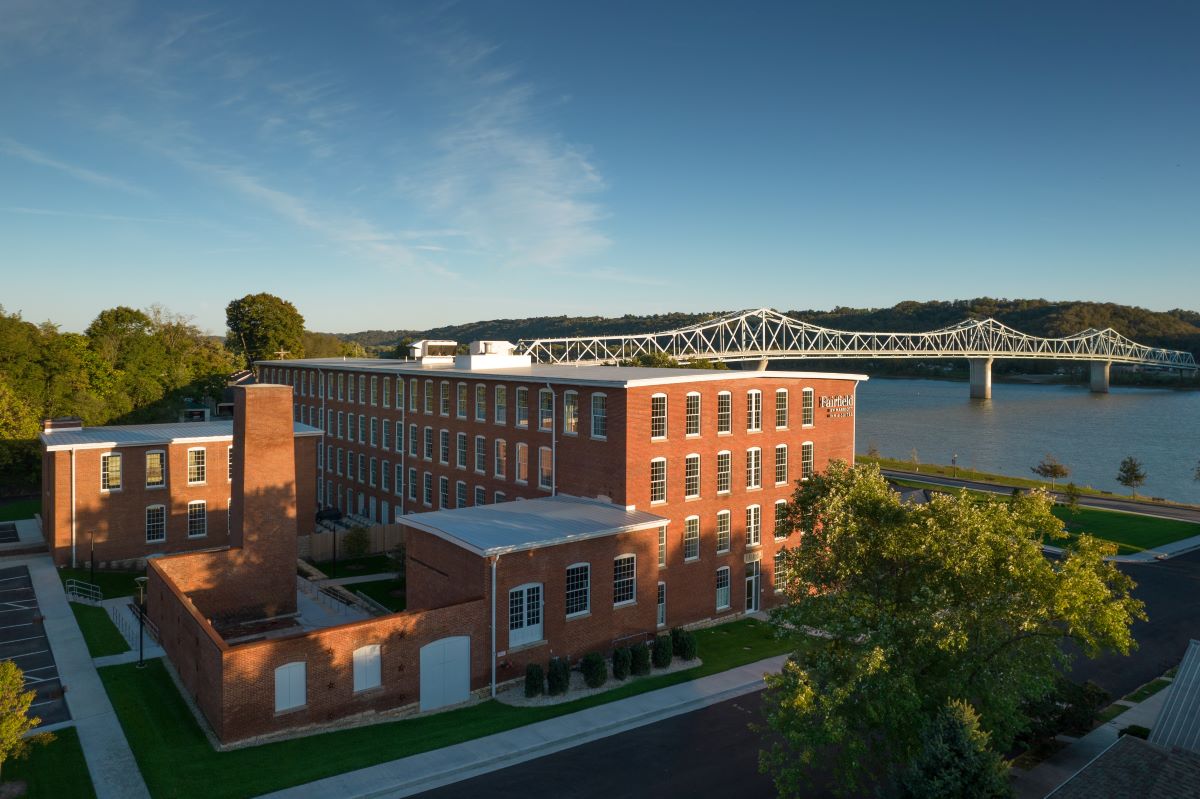 a building with a bridge over the water