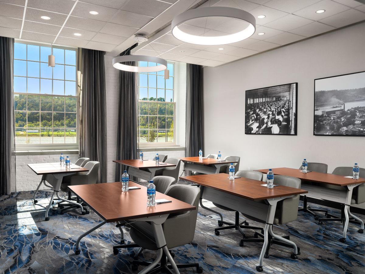 a room with tables and chairs