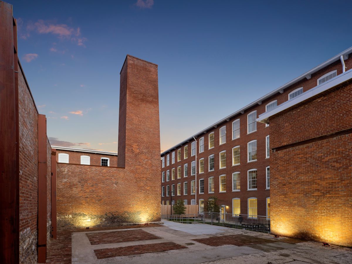a brick building with a brick chimney
