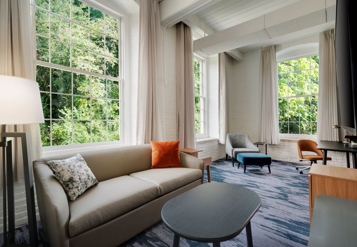 a room with couches and chairs