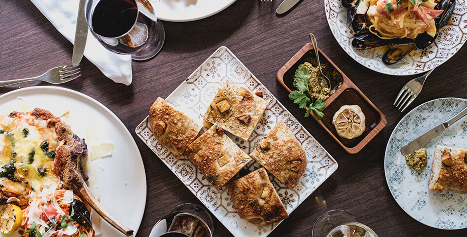 food on a plate next to a plate of food