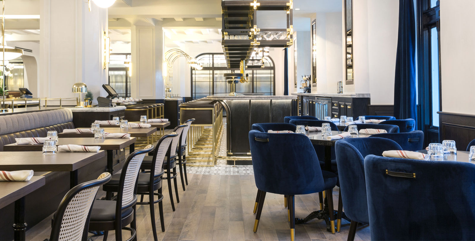 a restaurant with tables and chairs