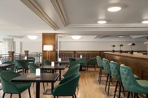 a room with tables and chairs