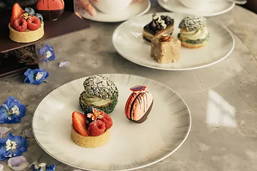 a plate of desserts on a table