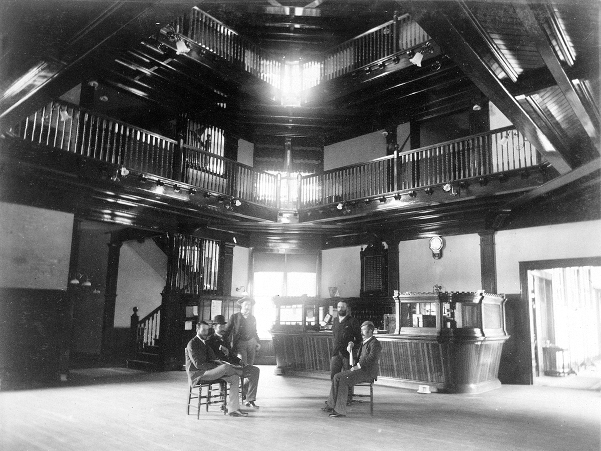 a group of men sitting in a room