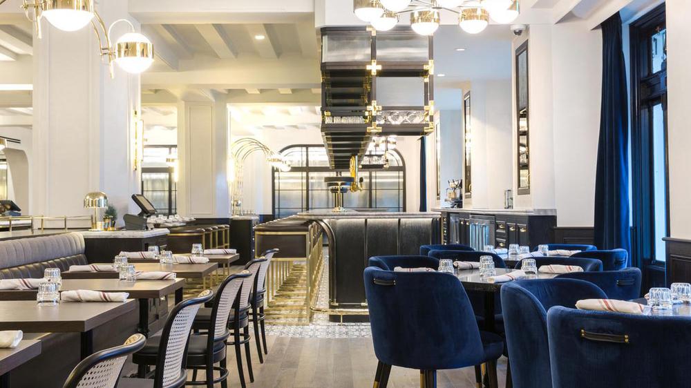 a restaurant with tables and chairs