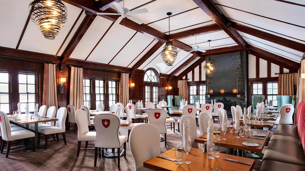 a room with tables and chairs