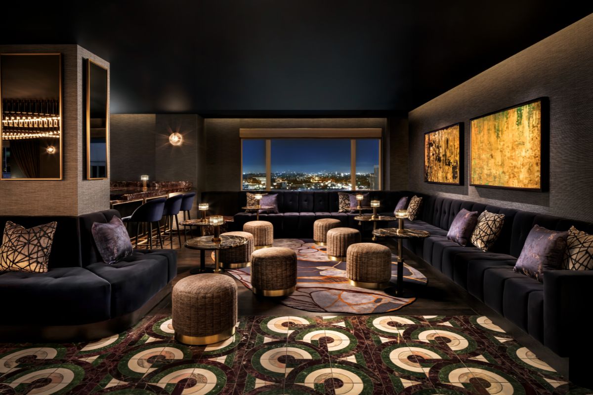 a room with a couch and tables