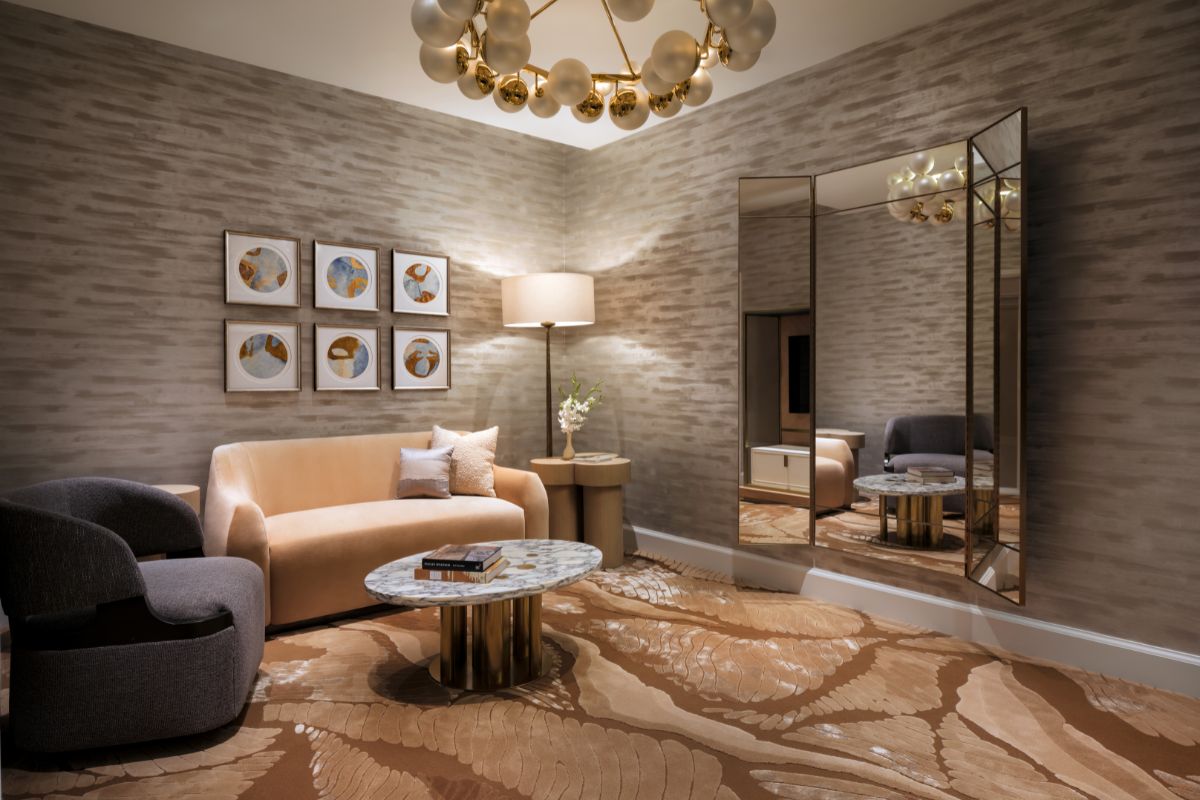 a room with a couch and a mirror