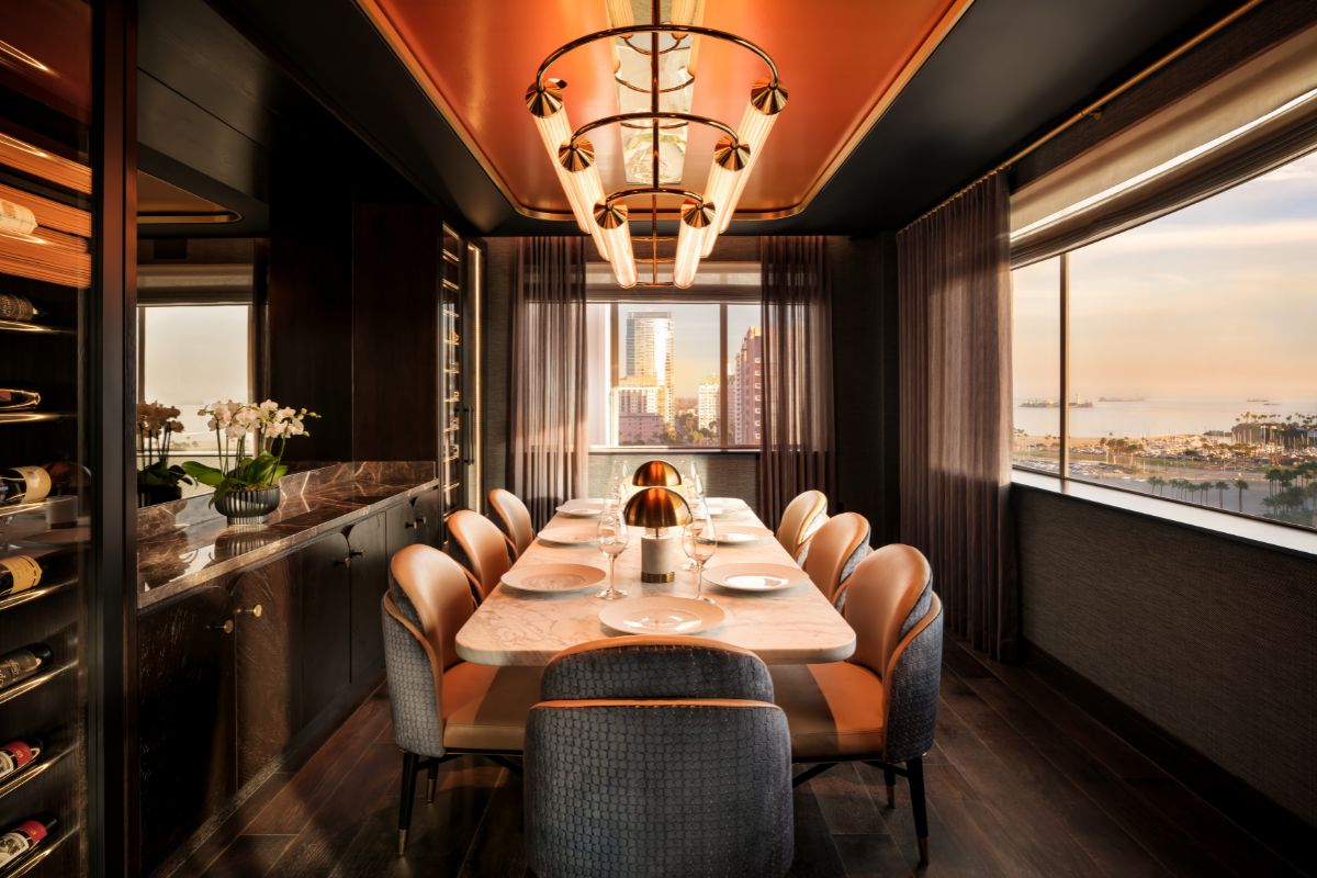 a dining room with a table and chairs