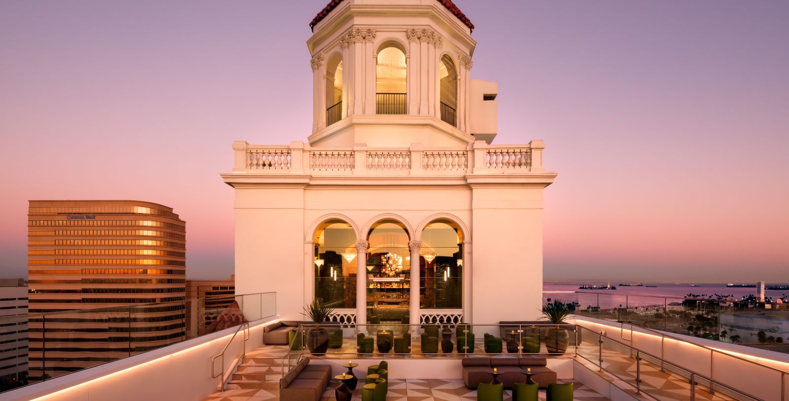 a building with a roof and a balcony