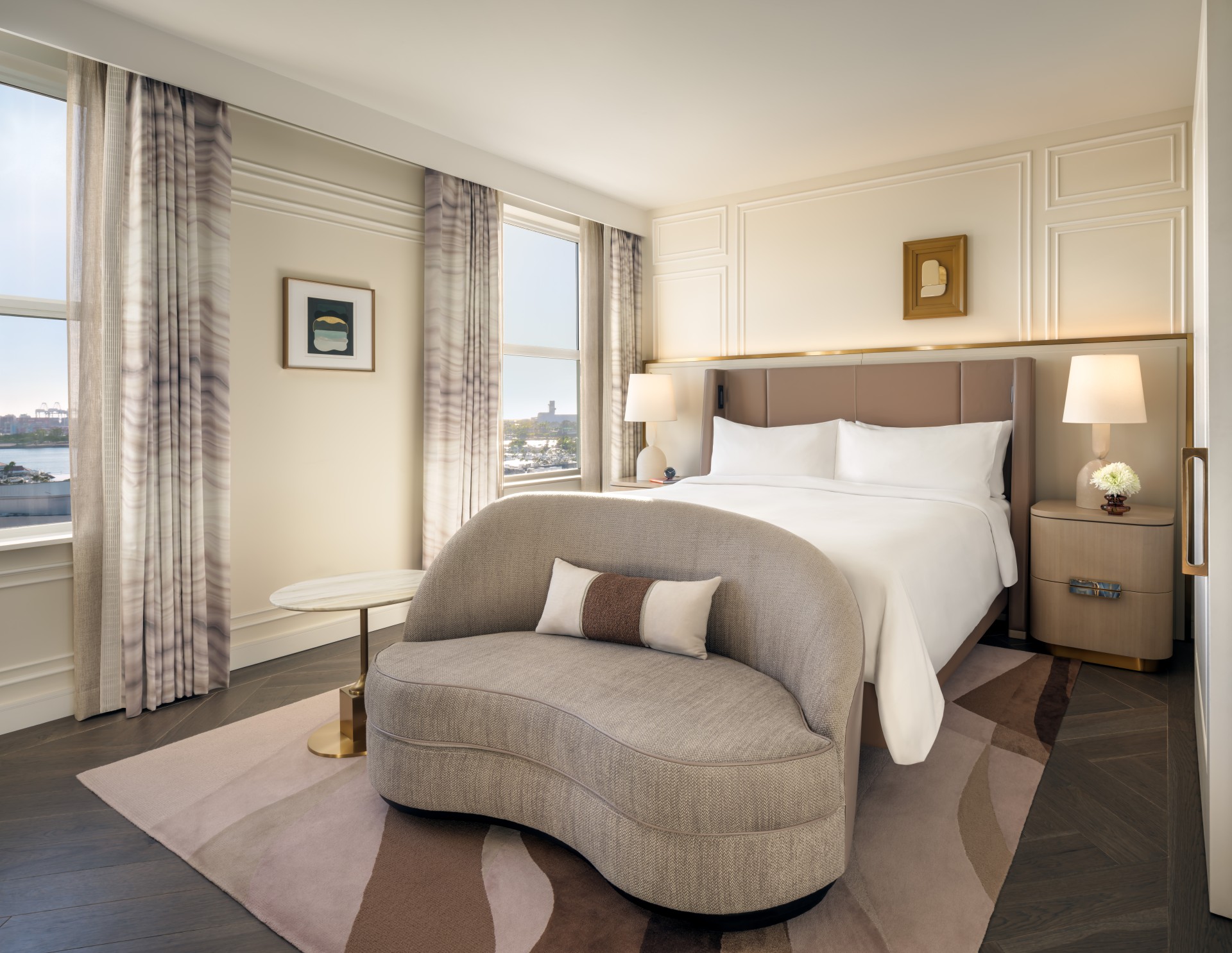 a bedroom with a bed and a couch
