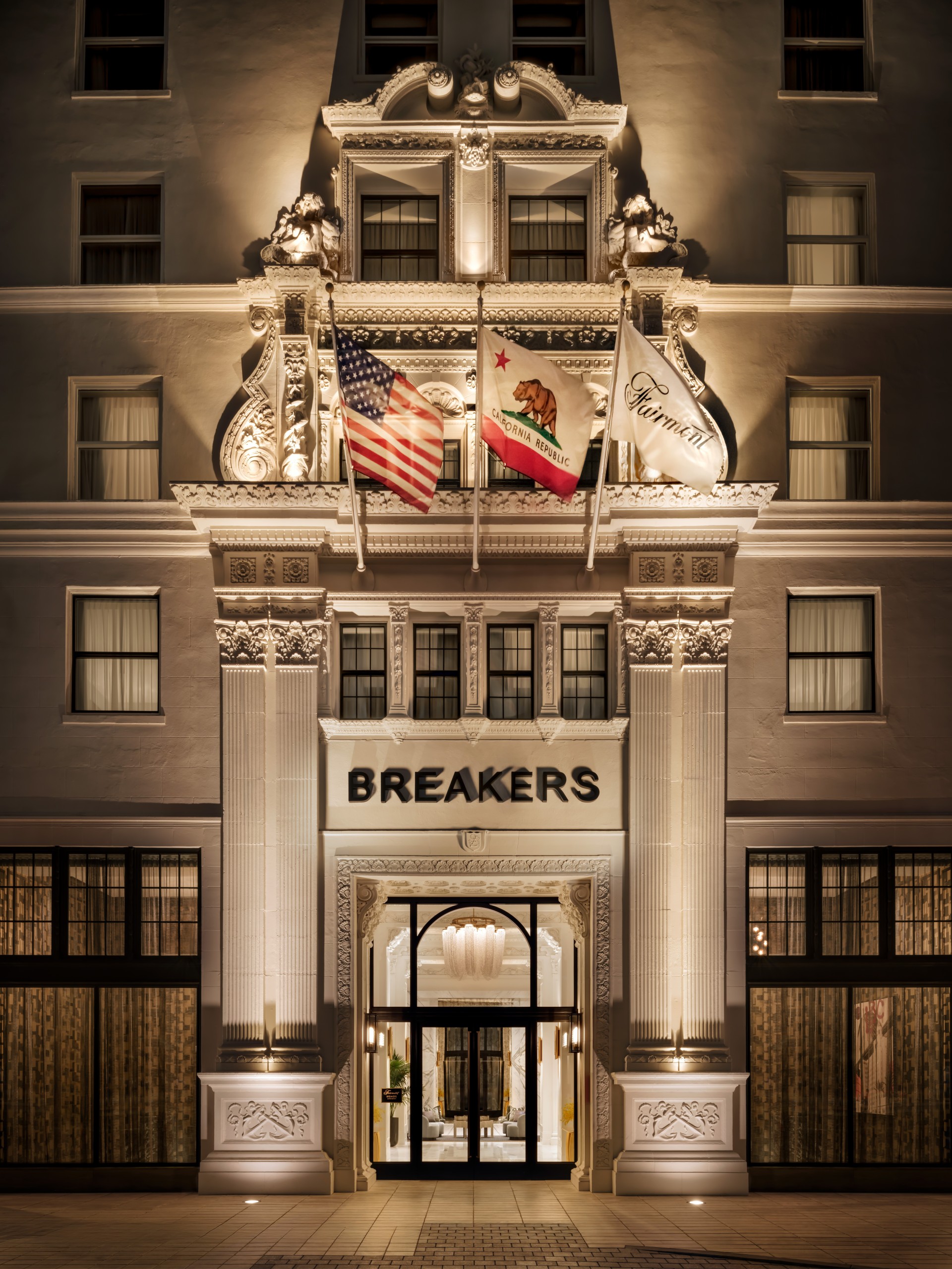 a building with flags on the front