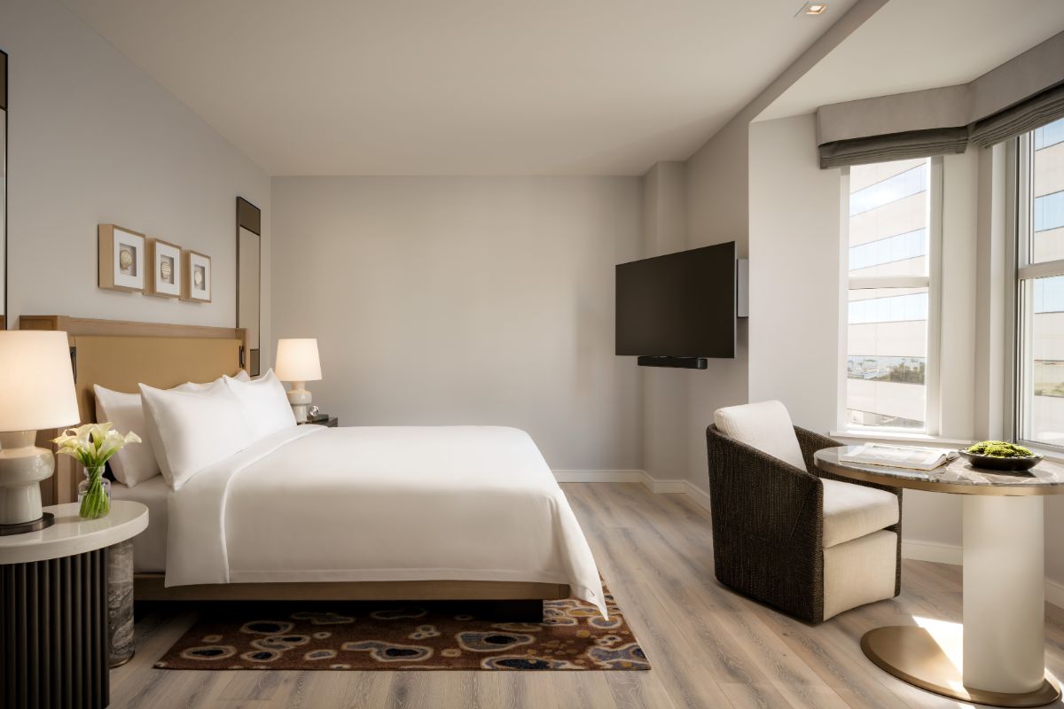 a room with a bed and a chair