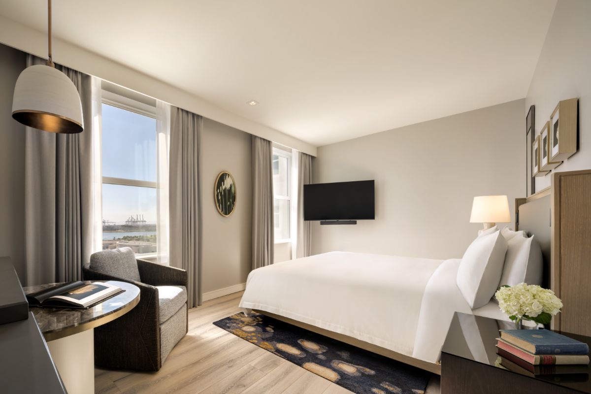 a room with a bed and a chair