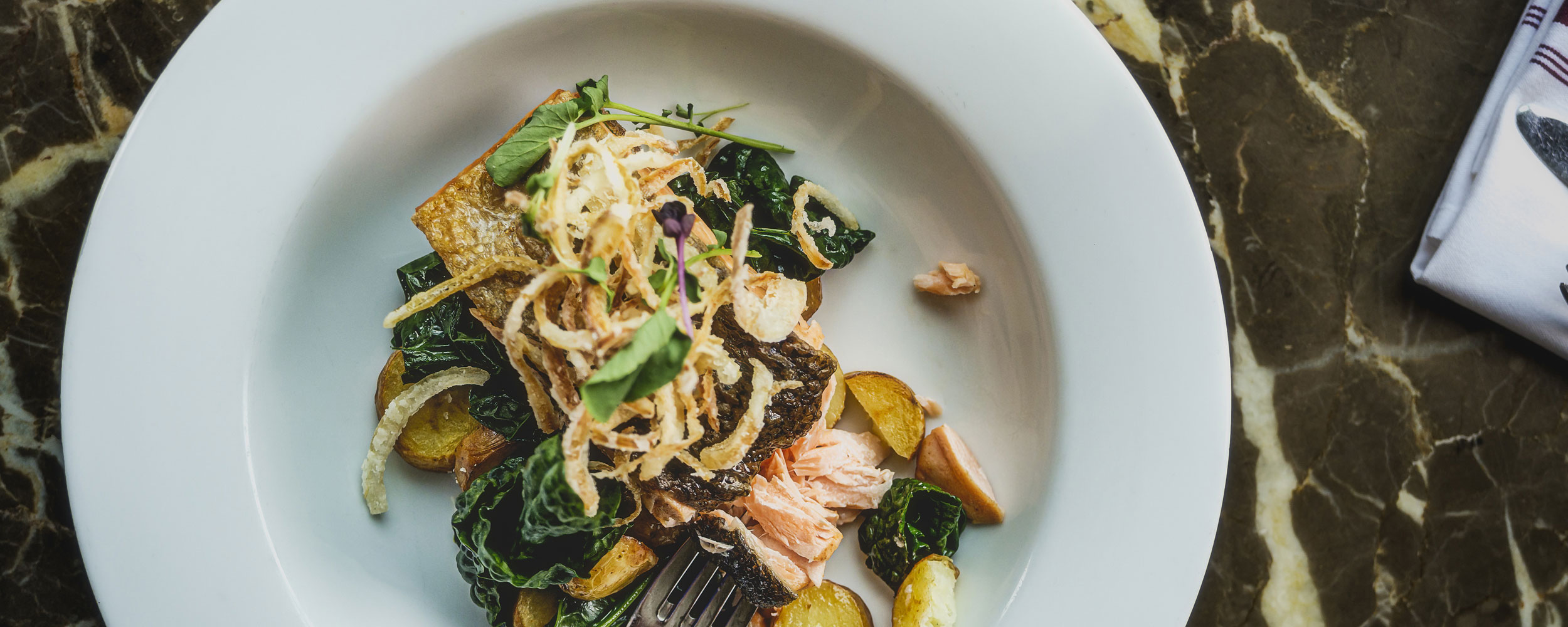 a plate of food with a fork