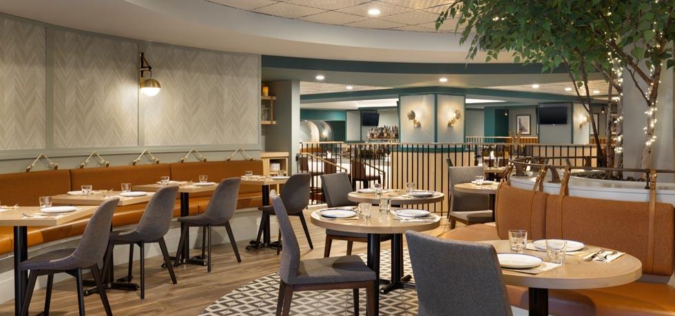 a restaurant with tables and chairs
