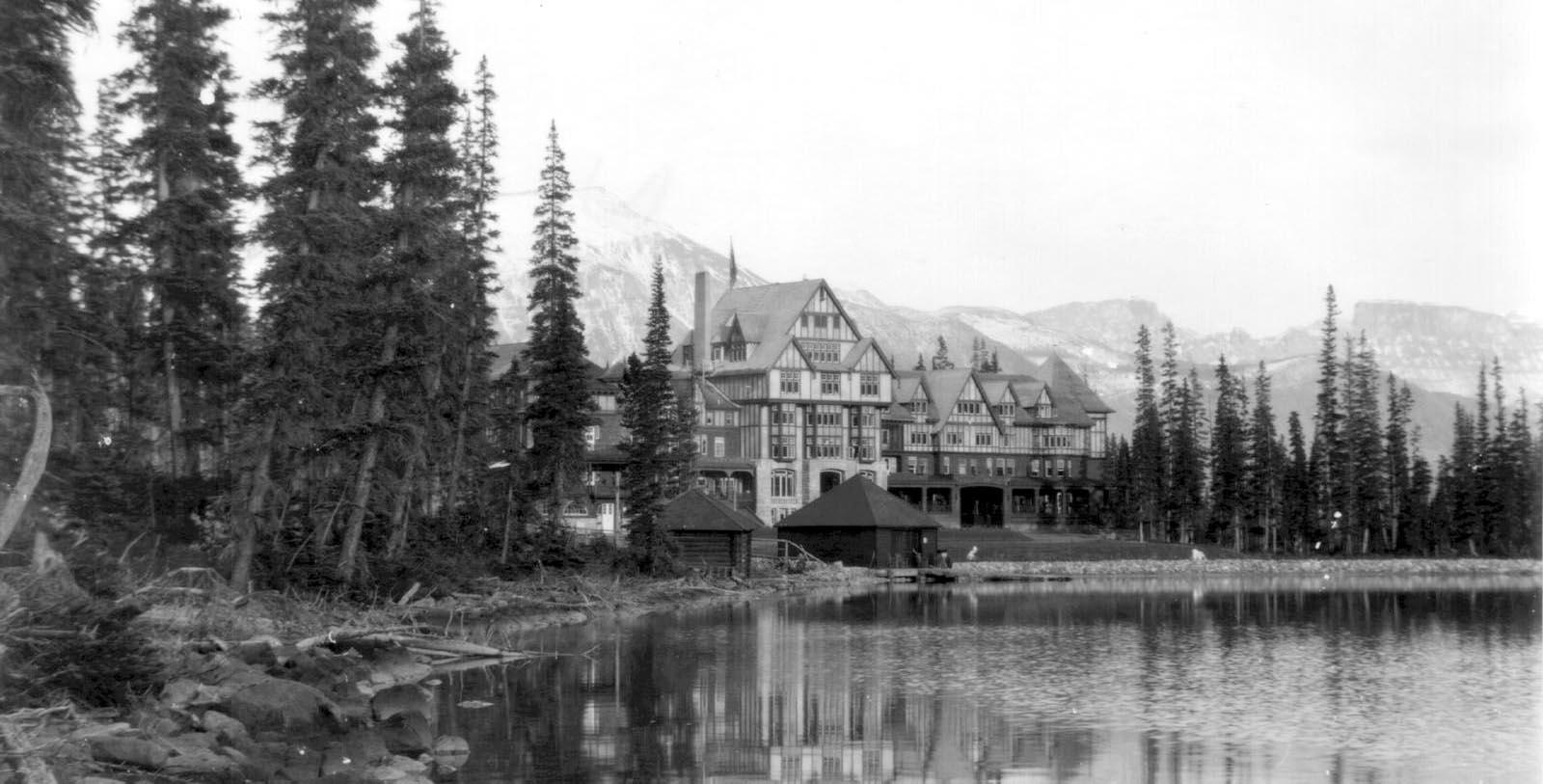 a building next to a lake