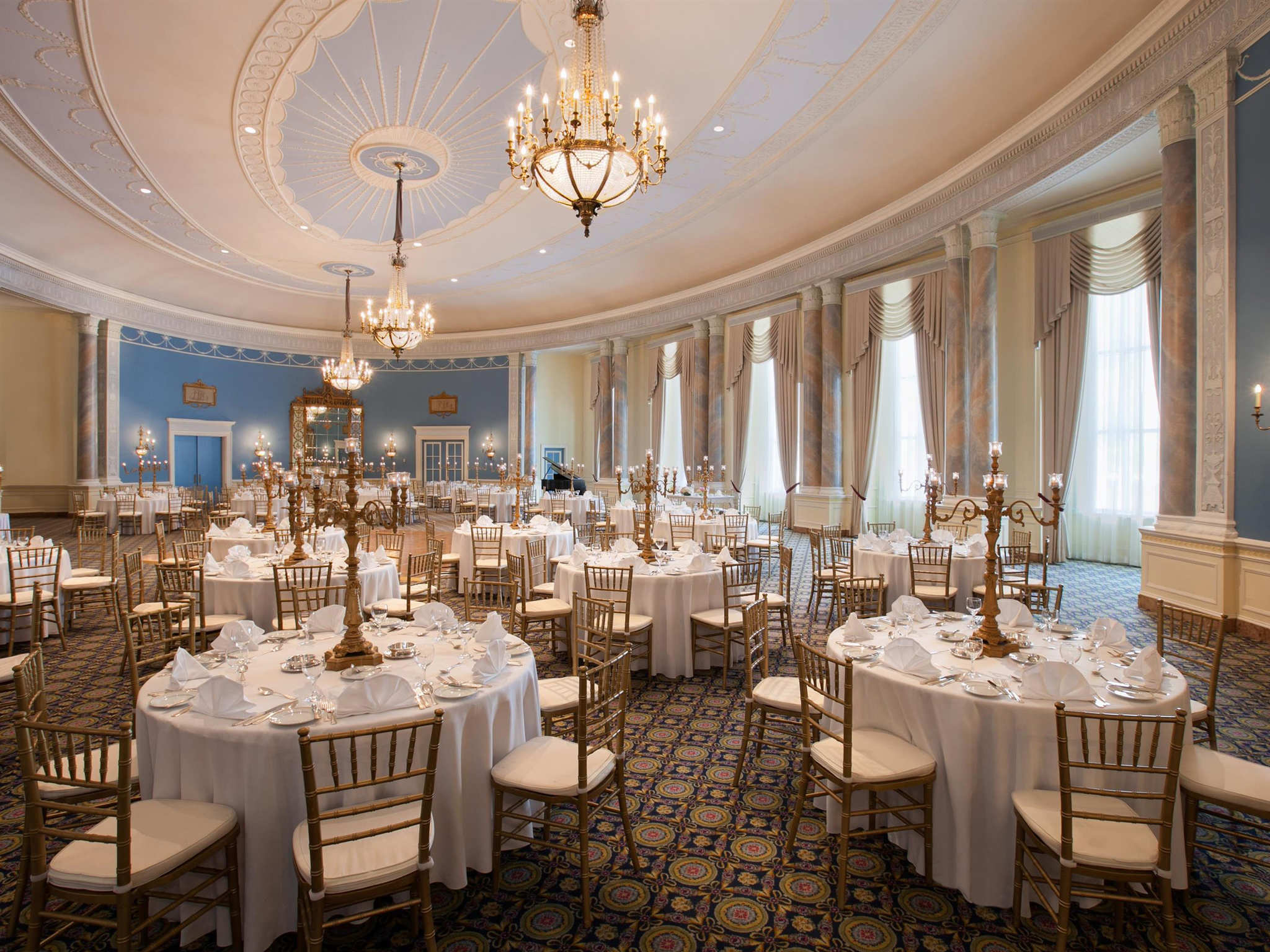 a room with tables and chairs