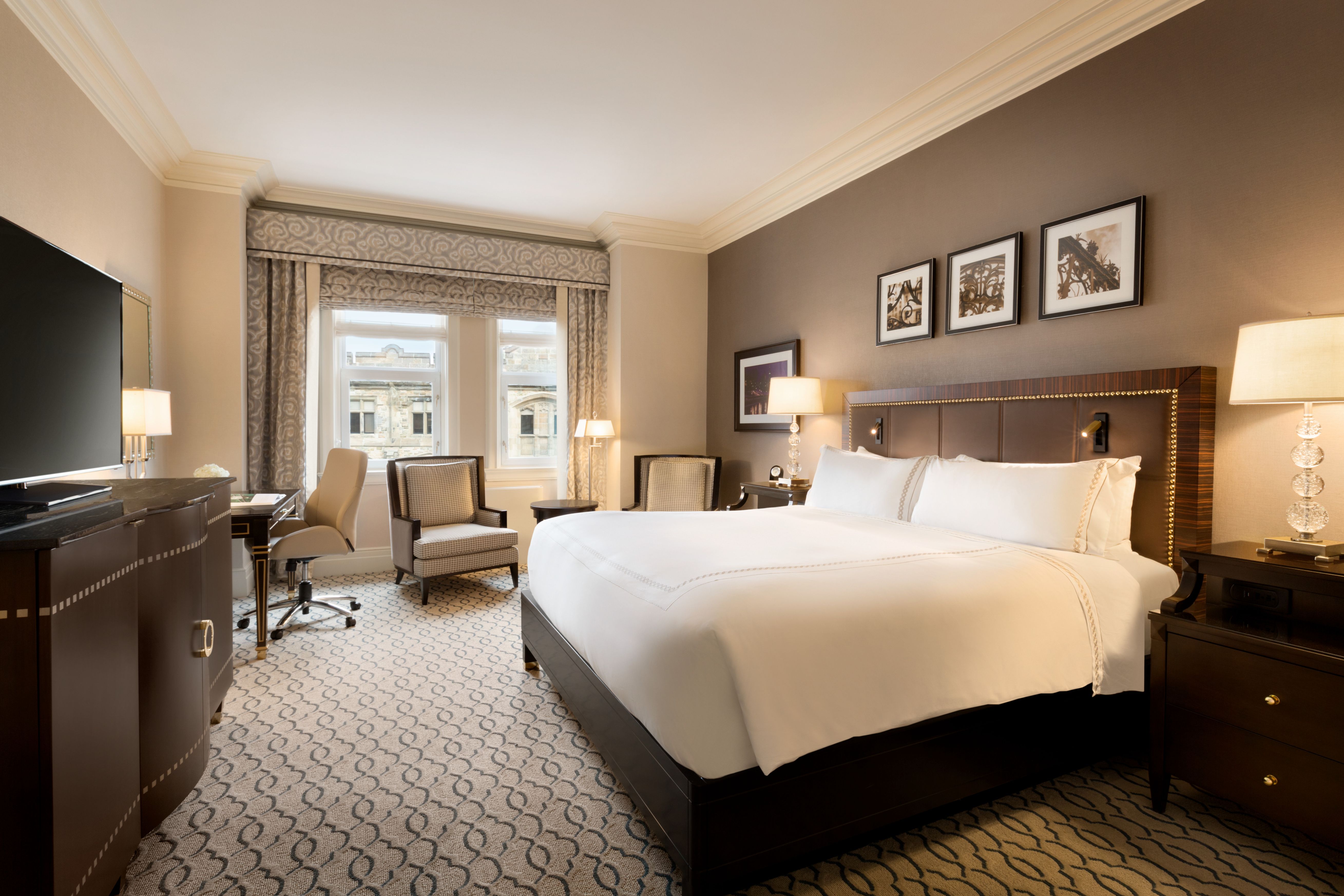 a room with a bed and a desk