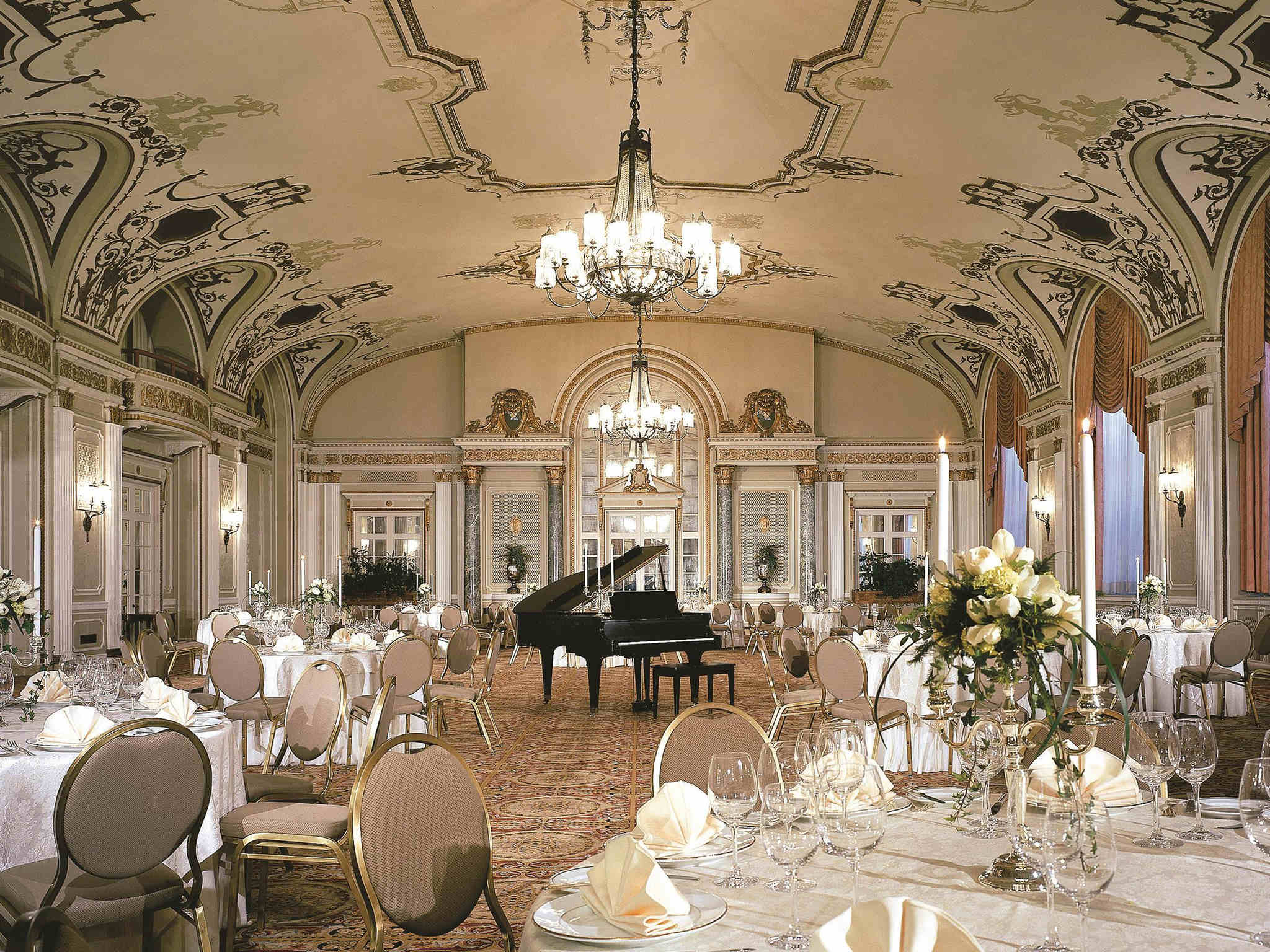 a room with tables and chairs