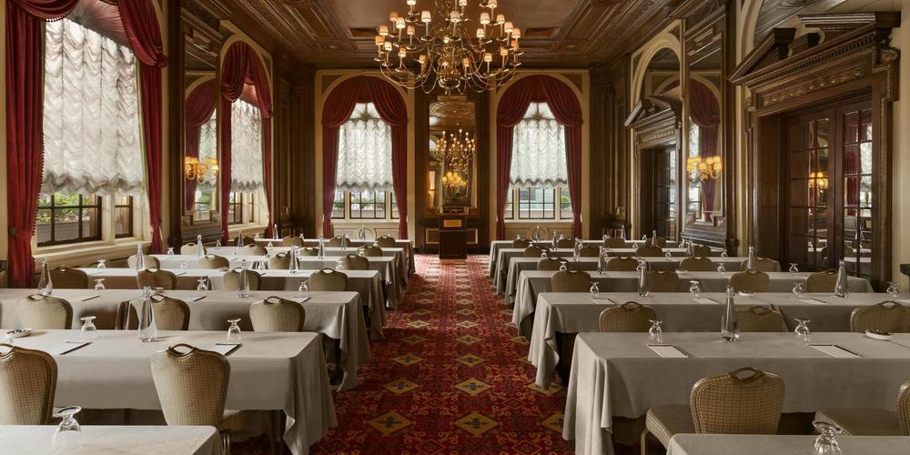 a room with tables and chairs