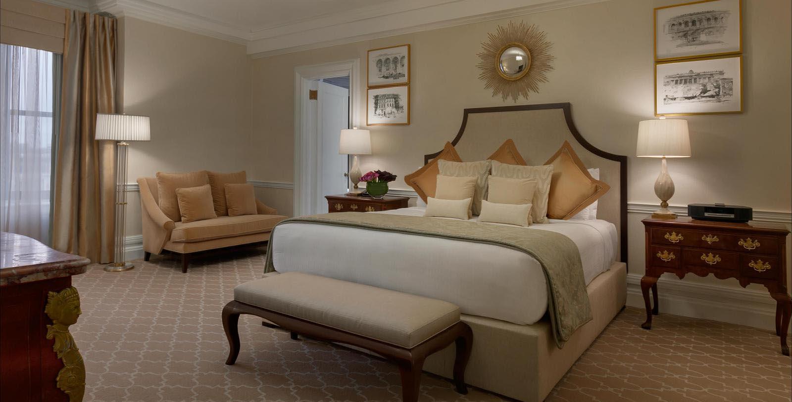 a bedroom with a bed and a couch