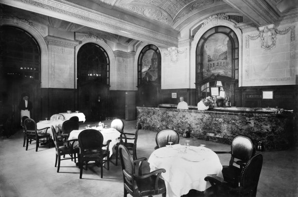 a restaurant with tables and chairs