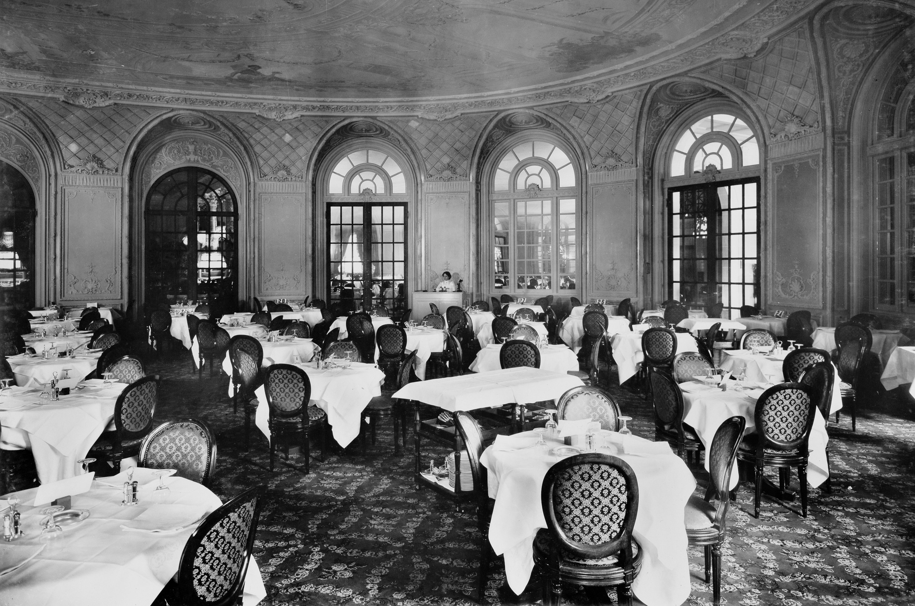 a room with tables and chairs