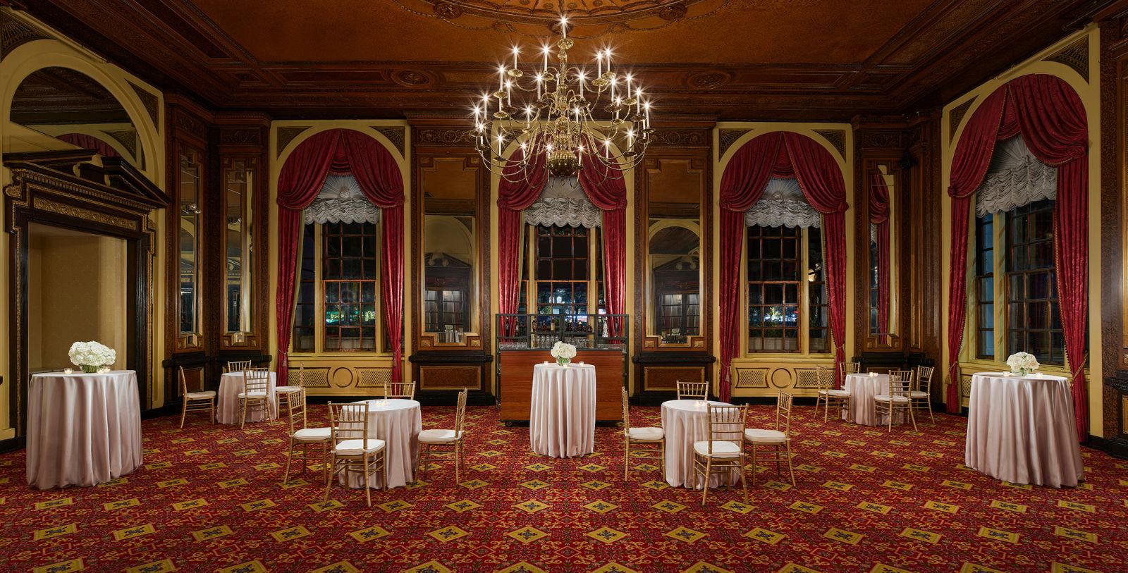 a room with tables and chairs