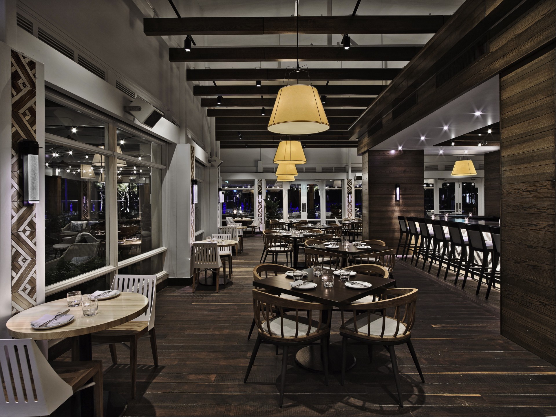 a restaurant with tables and chairs