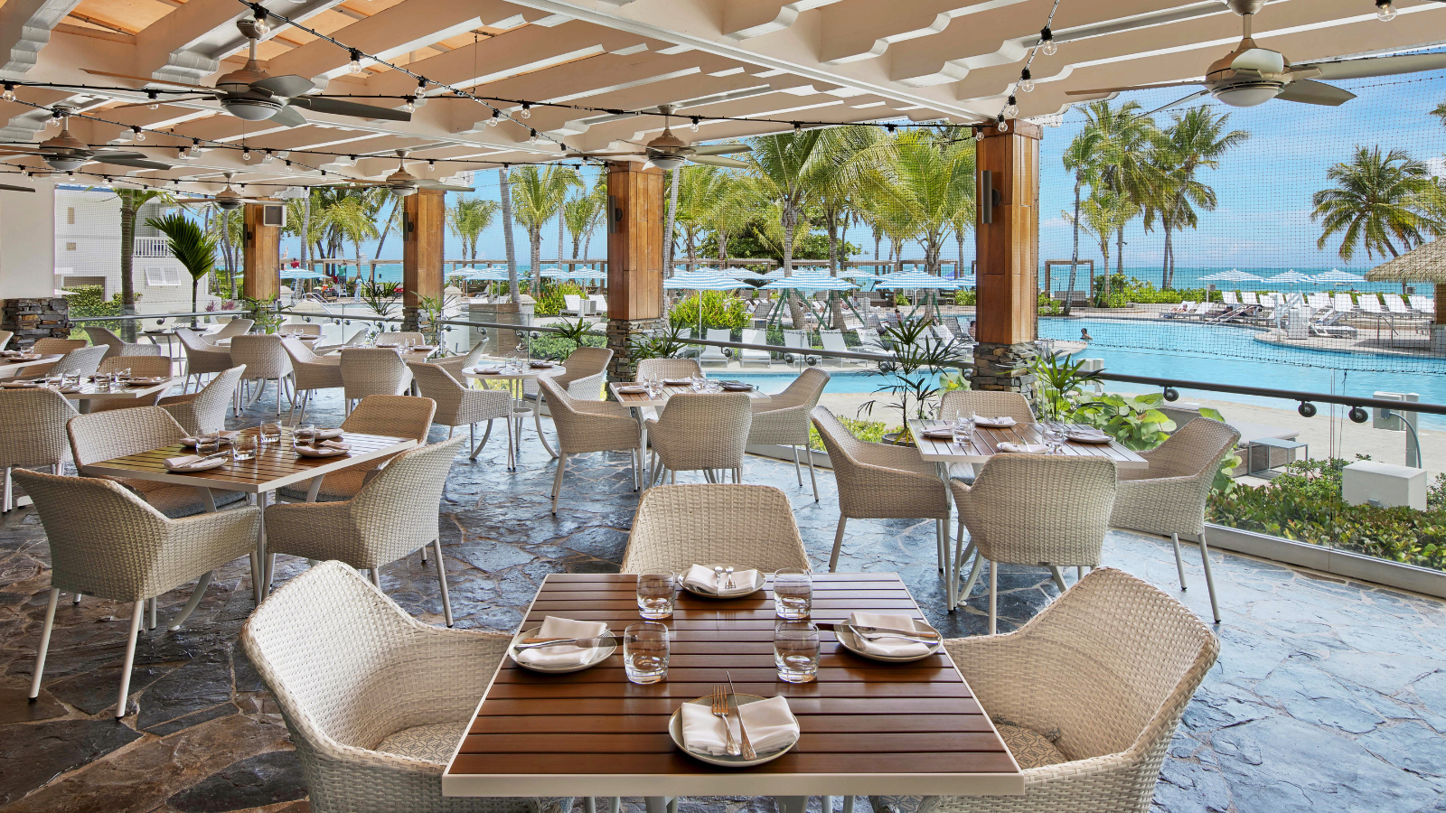 a restaurant with tables and chairs