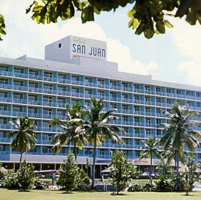 a building with palm trees