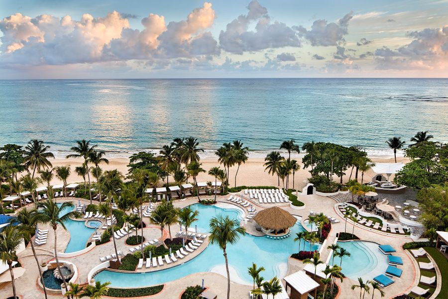 a swimming pool on a beach