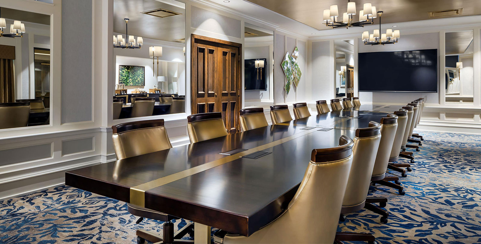 a conference room with a large table and chairs