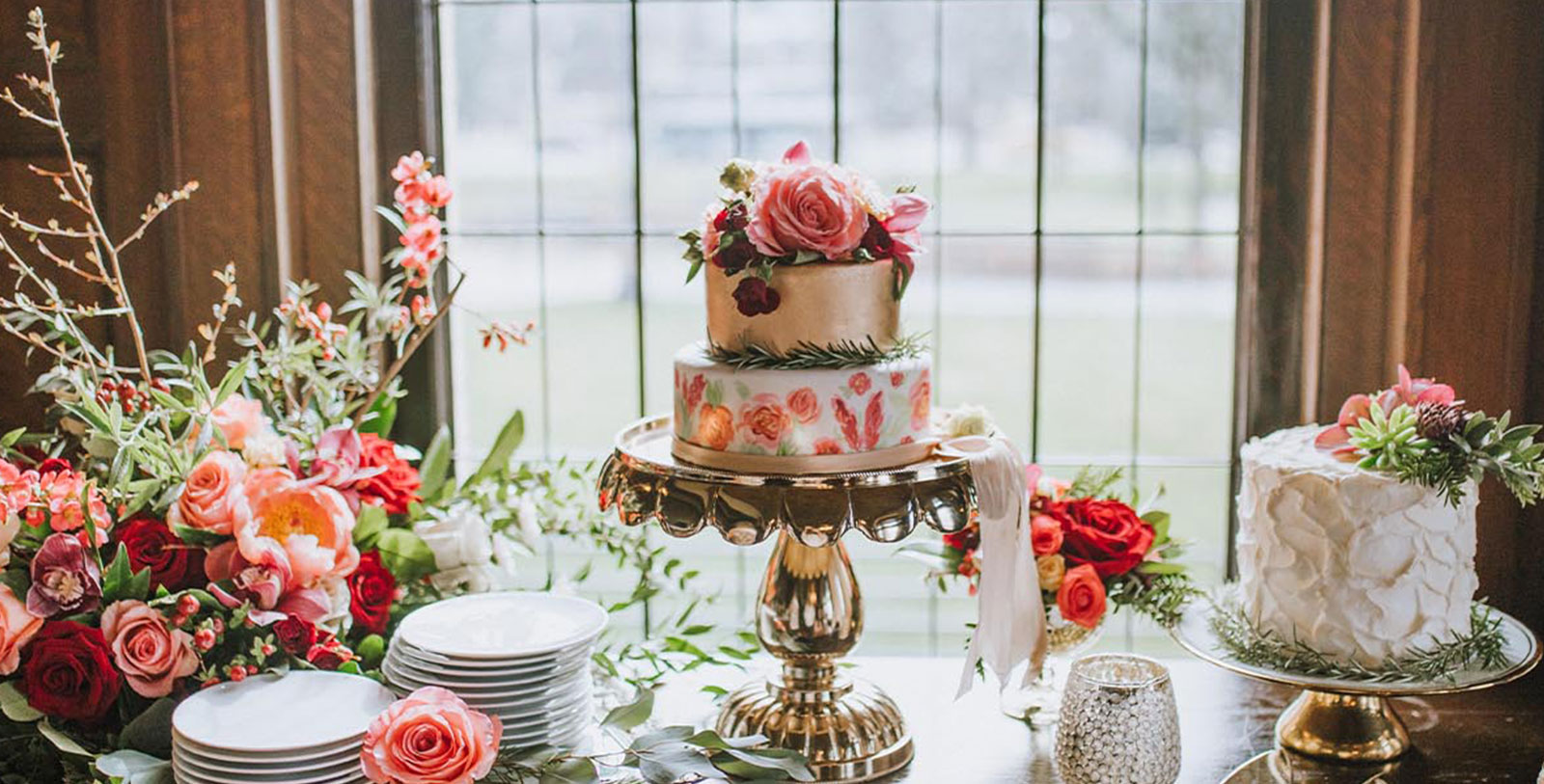 a cake with flowers on a table