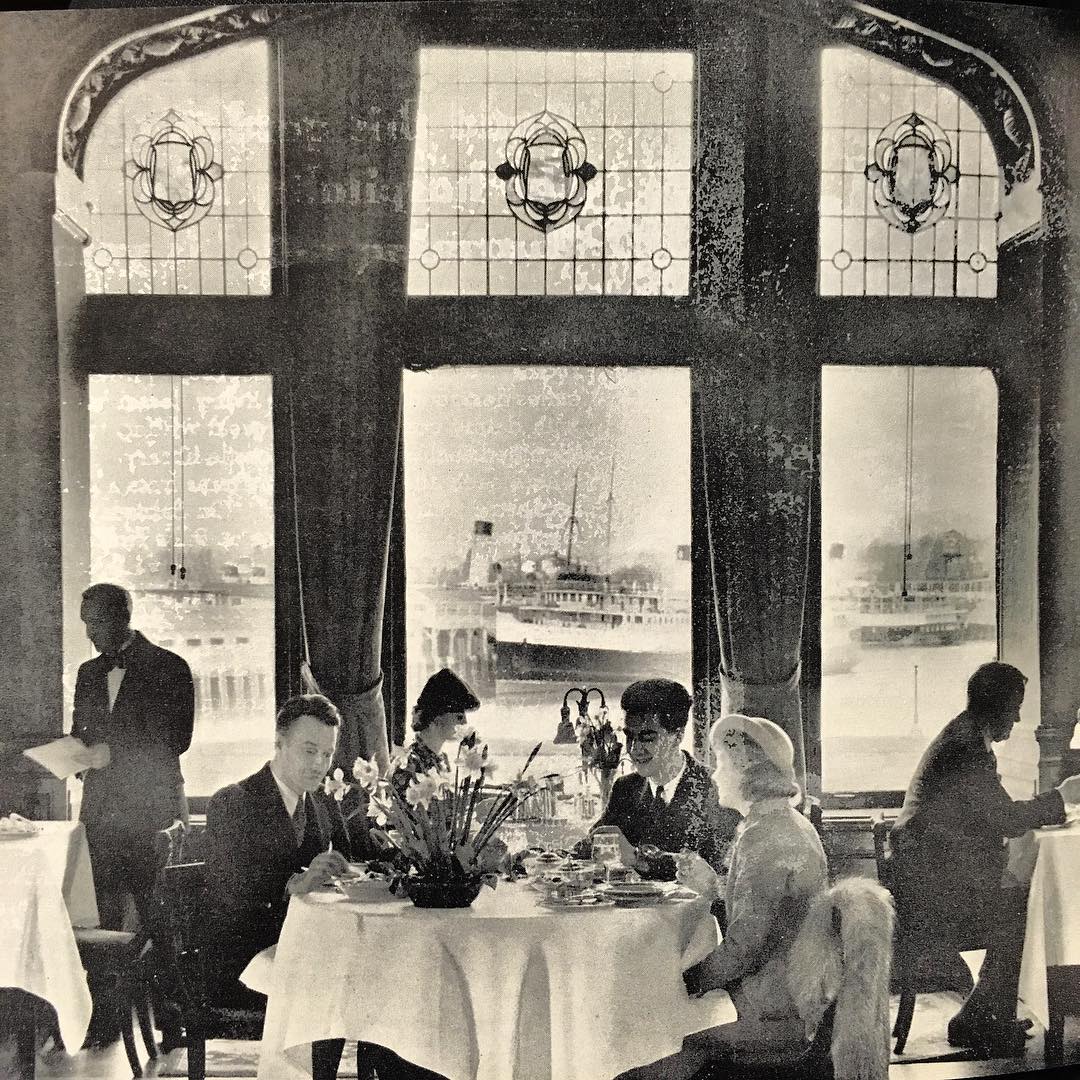 a group of people sitting at a table