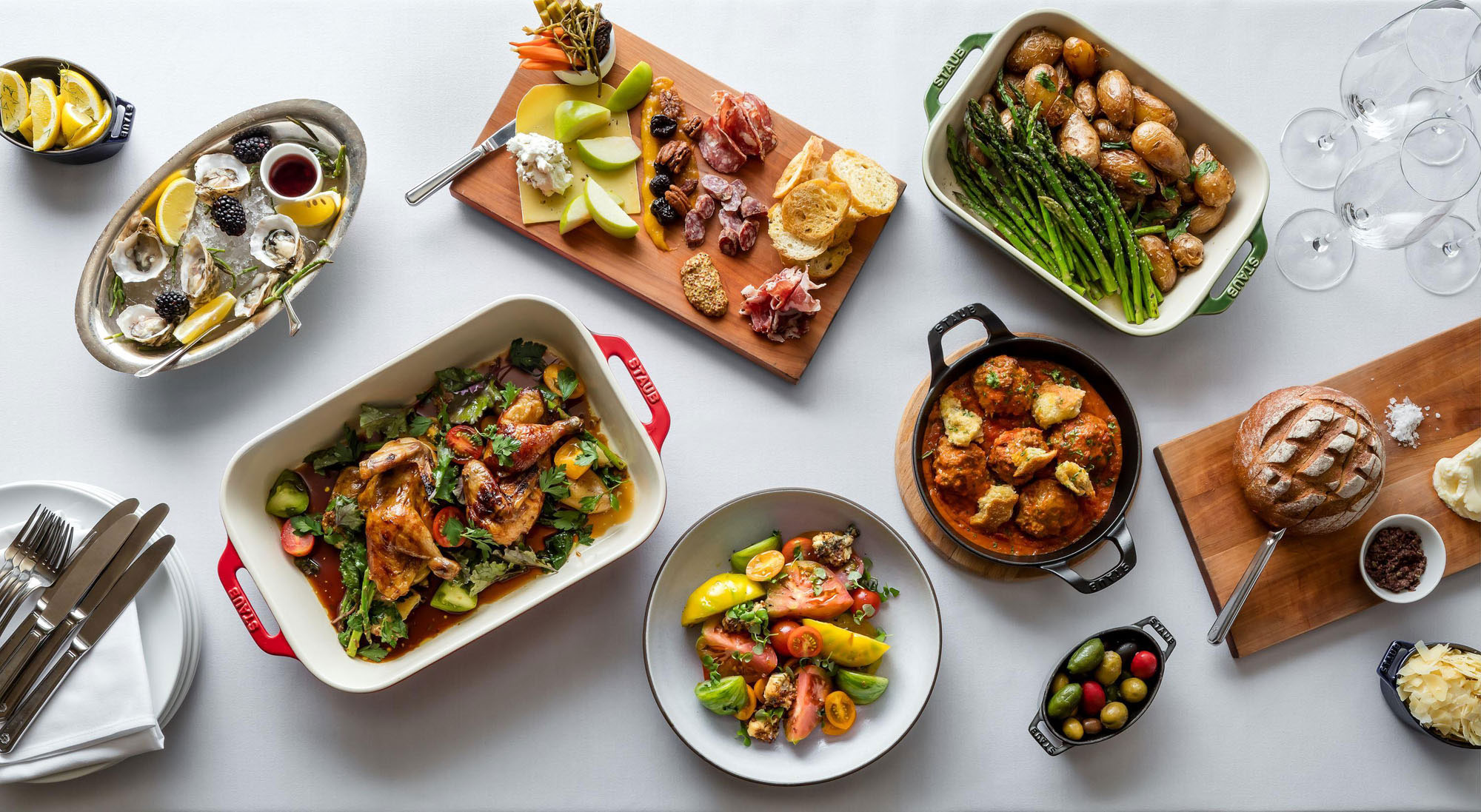 a table with different food dishes
