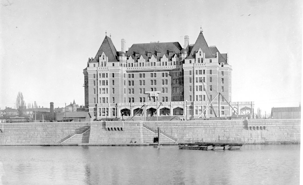 a large building next to a body of water