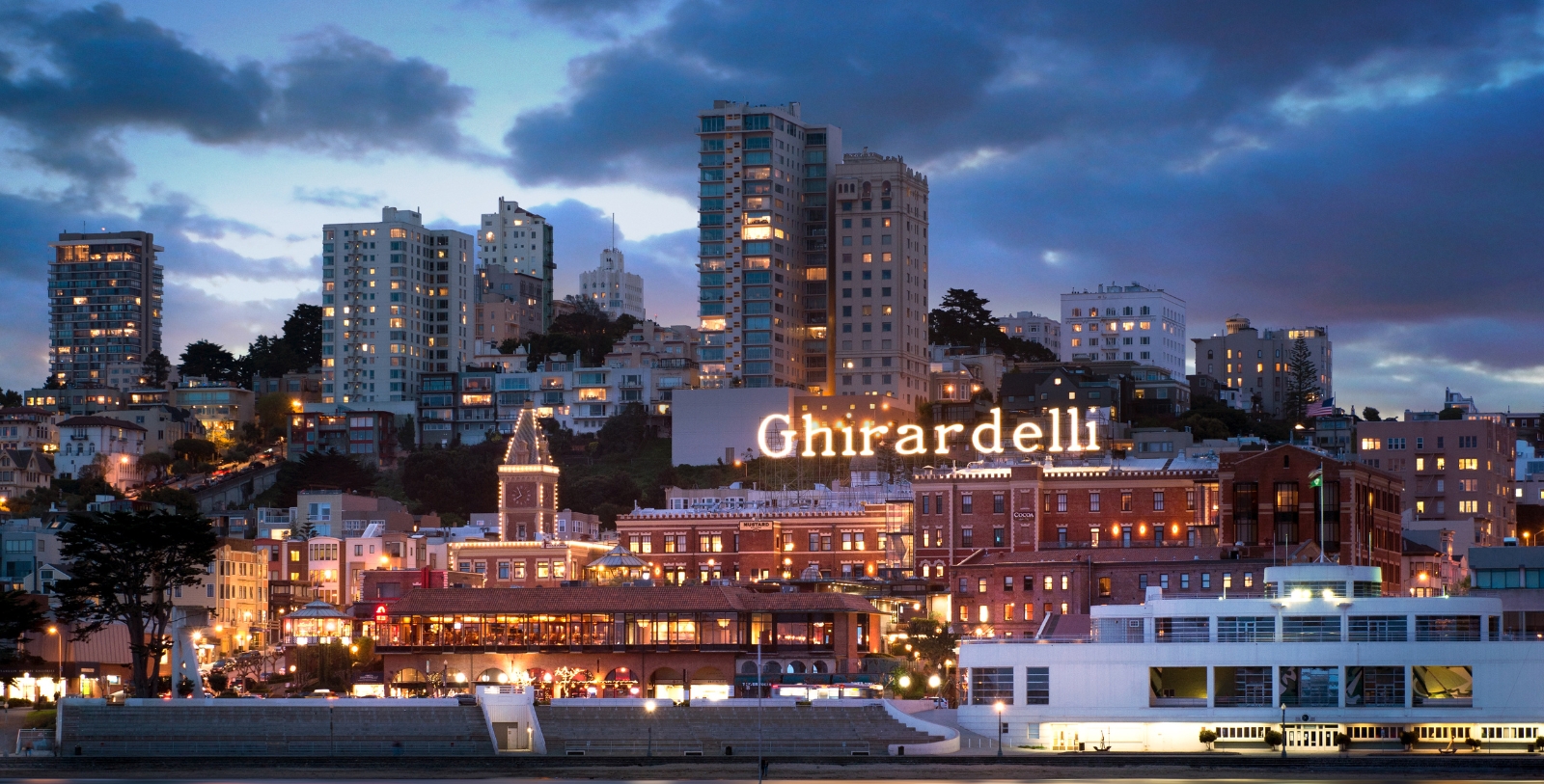 a city with buildings and boats