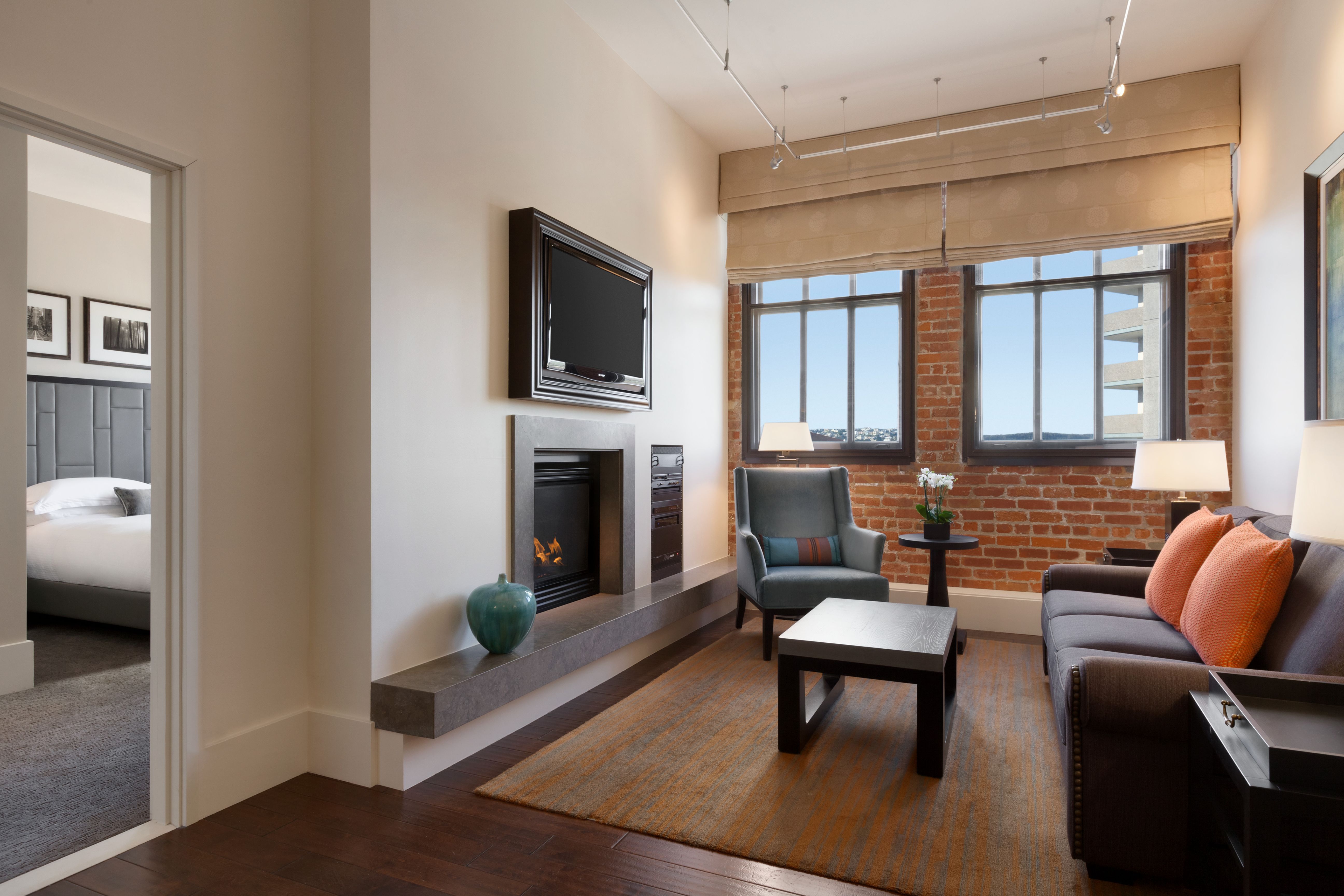 a living room with a fireplace and a couch