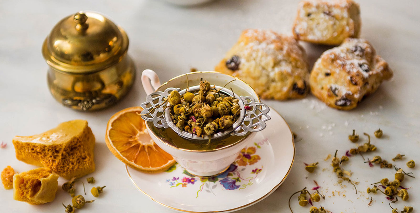 a cup of tea with dried flowers